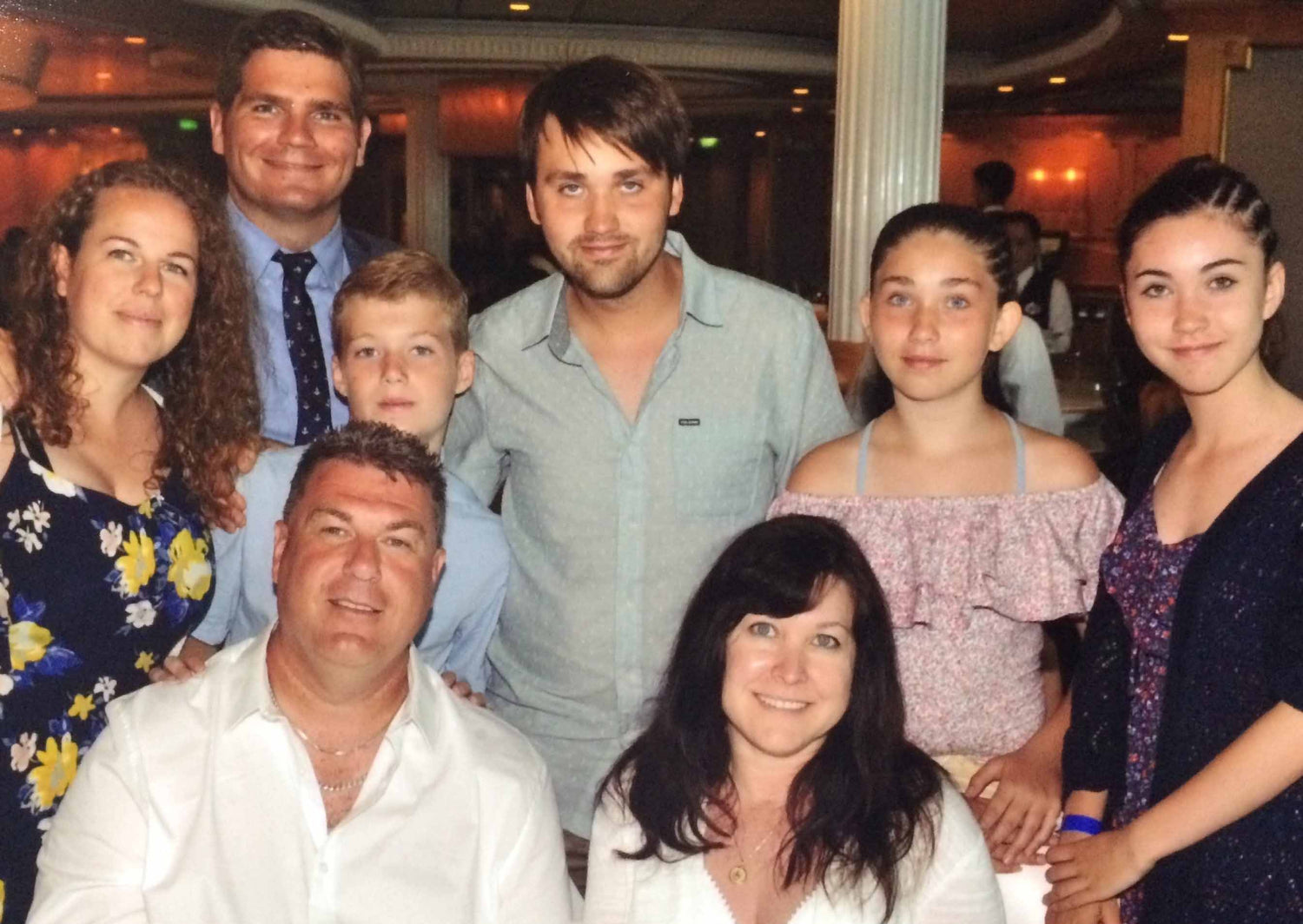 A picture of our family from a long time ago on a cruise we went on where my Dad and my step-mom Aileen got married. Pictured is me (Talon), my Dad (Mike), Aileen, Jenna, Tara, Thomas, Sheryl, and her husband Alex.